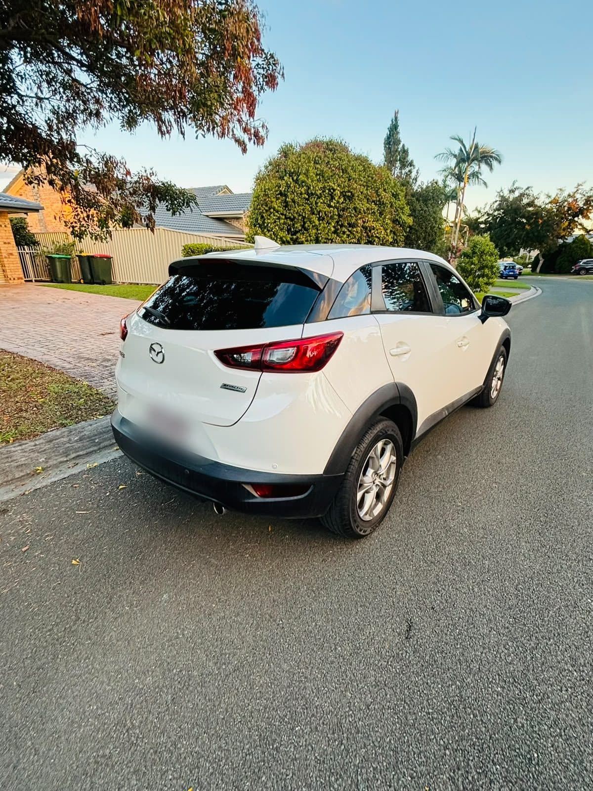White 2018 Mazda CX-3 parked on a suburban street, photo 4